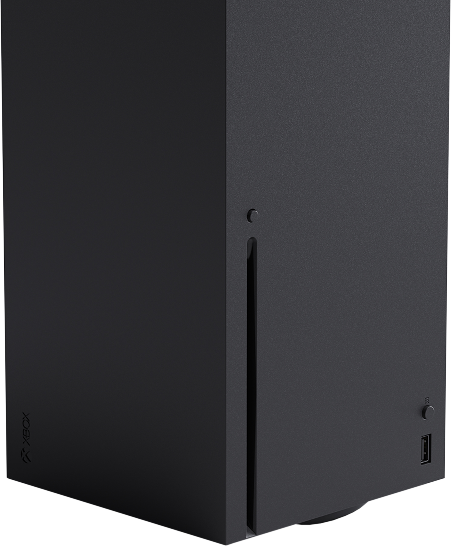 Una console Xbox Series X nera in piedi su una superficie bianca.