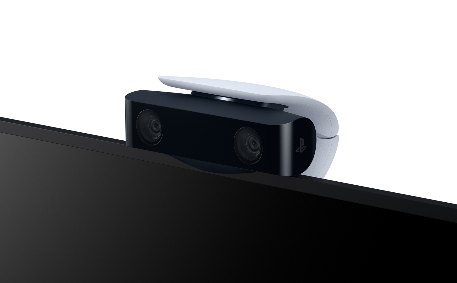 A black and white PlayStation 5 camera, positioned above a TV.