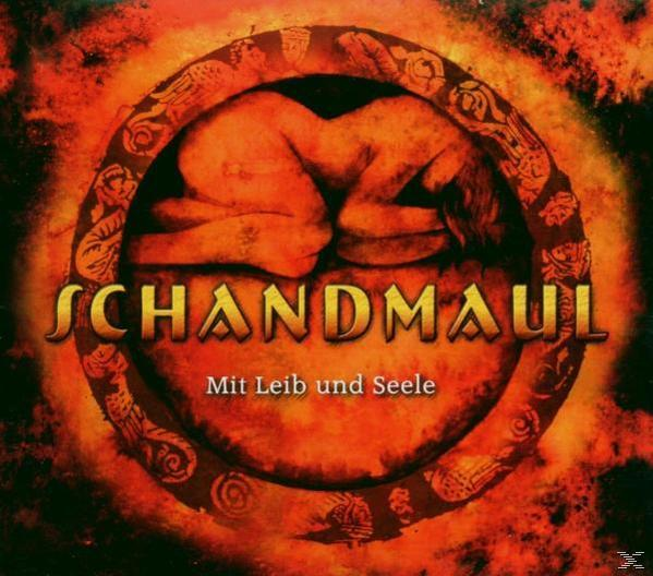 Albumcover. Eine nackte Person in einem Kreis mit goldenem Text. Roter und oranger Hintergrund.