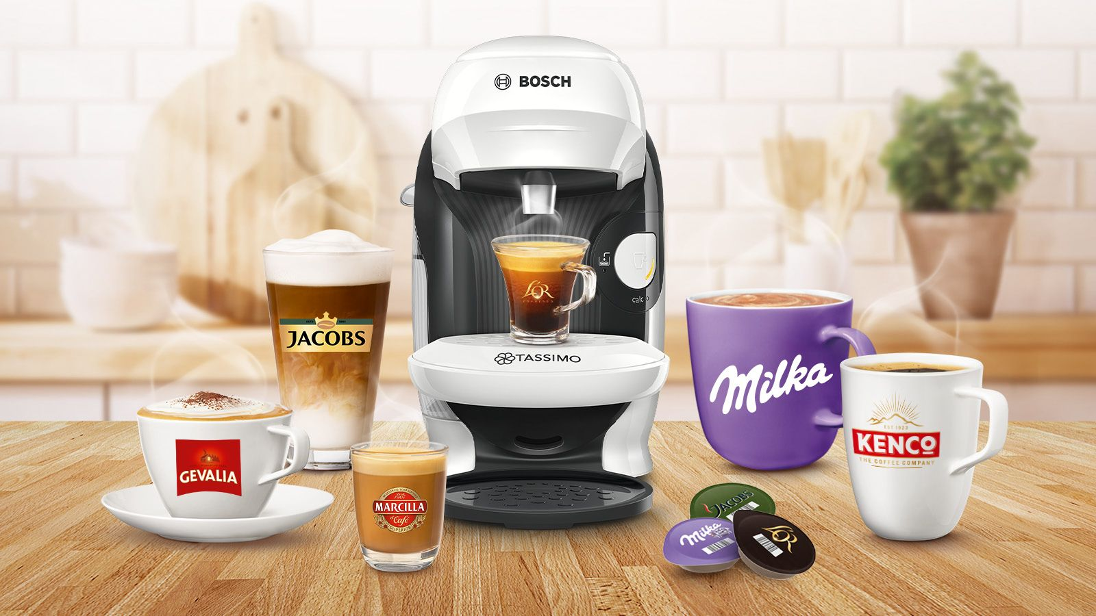 Kaffeemaschine und Kaffeetassen. Jacobs, Gevalia, Marcilla, Milka und Kenco Marken werden gezeigt.