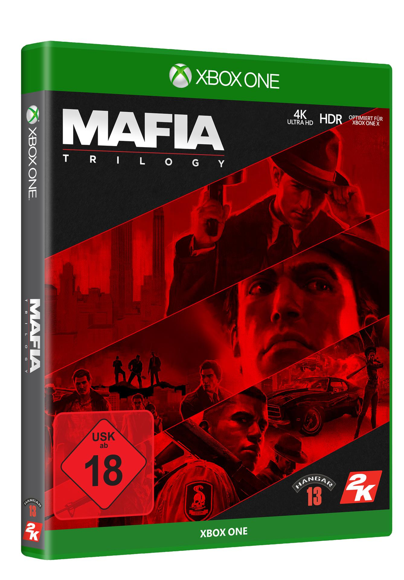 Xbox One Spielbox: Mafia Trilogy. Zeigt Schauspieler in Anzügen, Waffen und Autos, mit roter Bewertung.