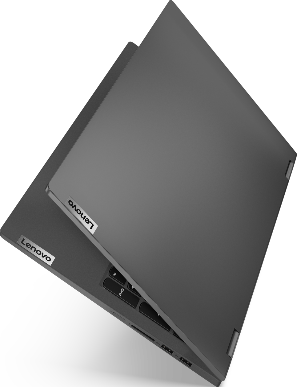 Ordinateur portable Lenovo gris, partiellement ouvert, montrant le logo et le clavier Lenovo.