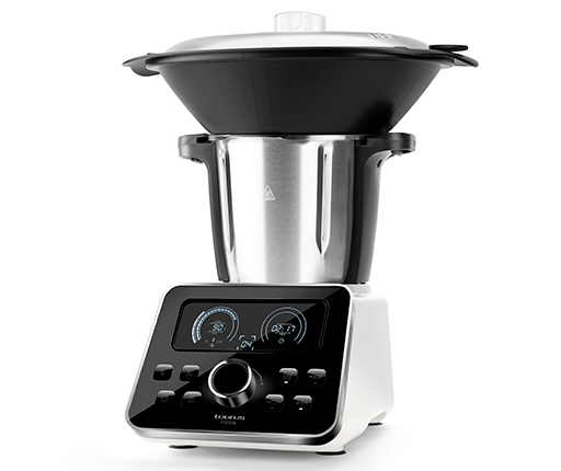 Un electrodoméstico de cocina blanco y plateado con una parte superior negra, panel de control y pantalla.