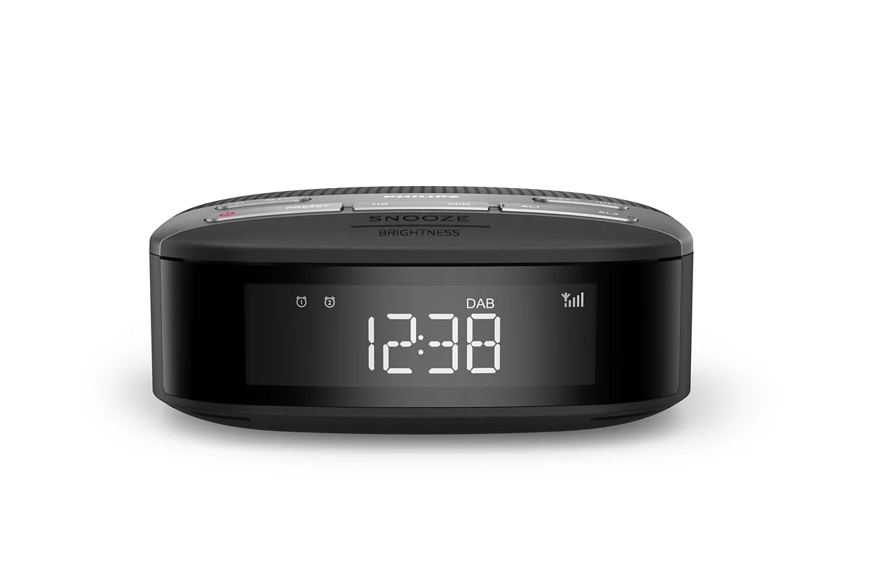 Black Philips alarm clock with a digital display showing 12:38.