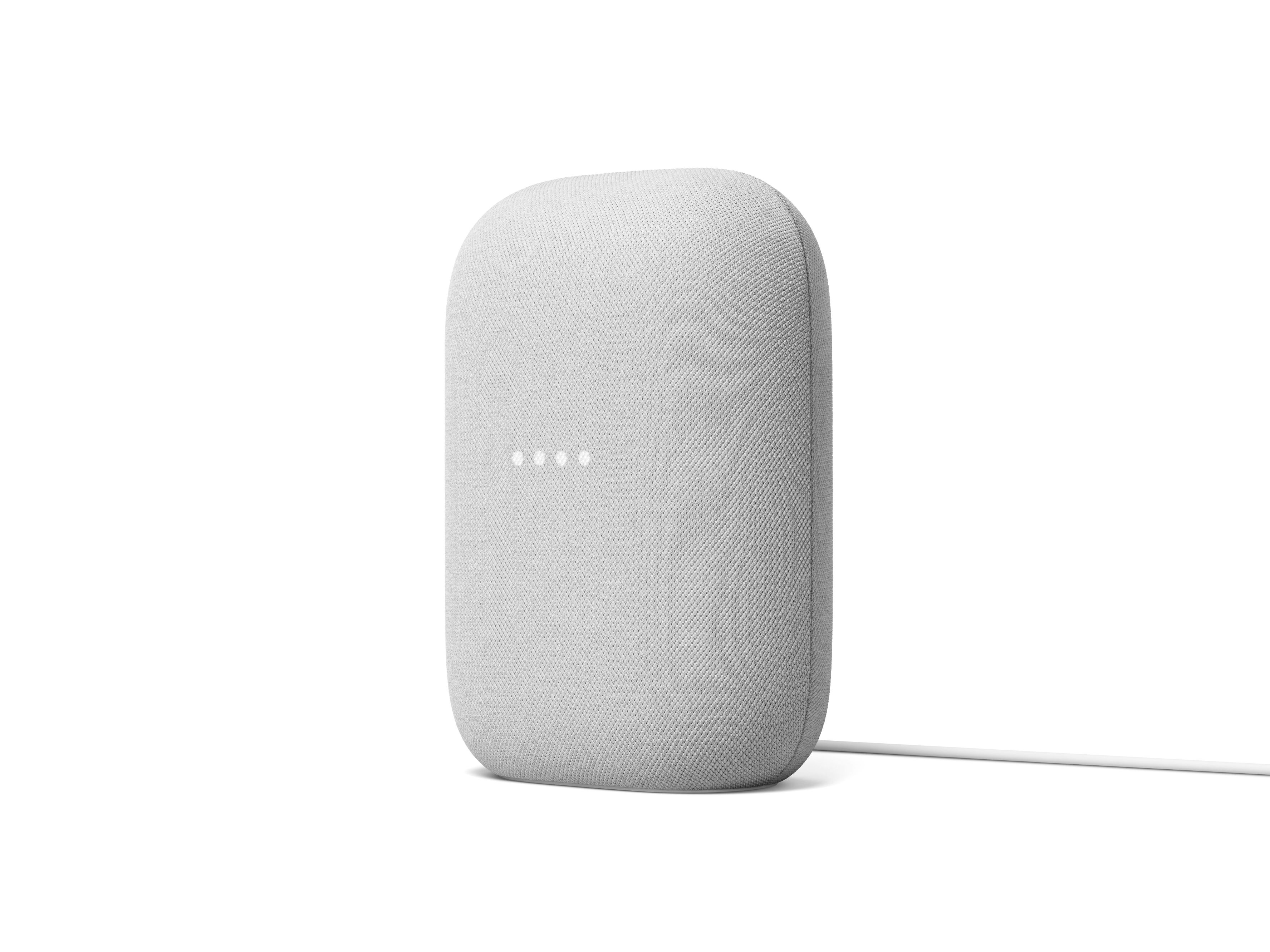 Un altavoz inteligente blanco de forma ovalada con una pequeña tira de luz y un cable blanco.