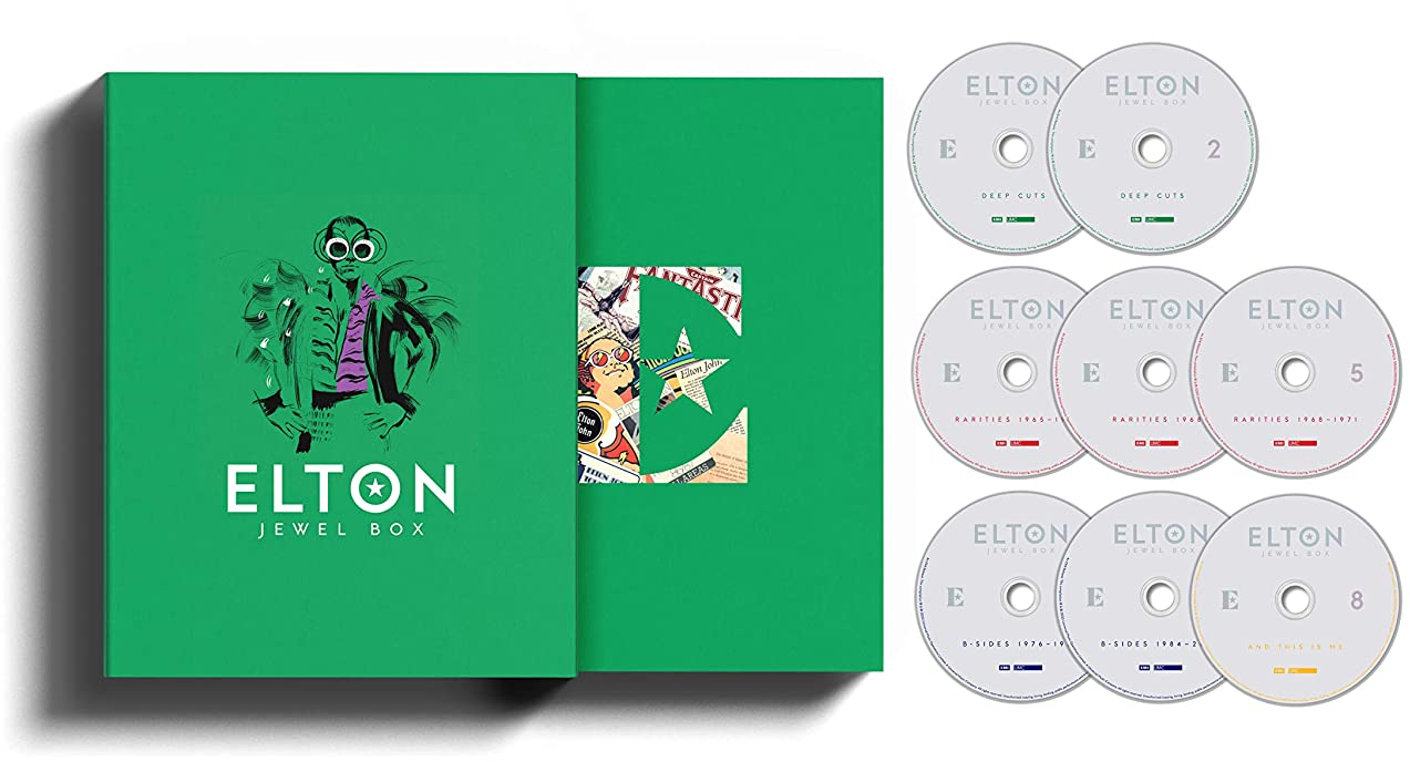 Elton John Jewel Box készlet. A doboz zöld, nyitott, egy csillag alakú kivágást mutat. A CD-k jobbra vannak.