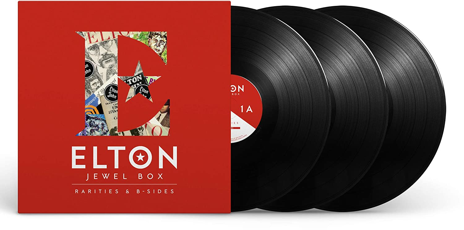 Piros albumborító Elton képével és fekete bakelit lemezekkel.