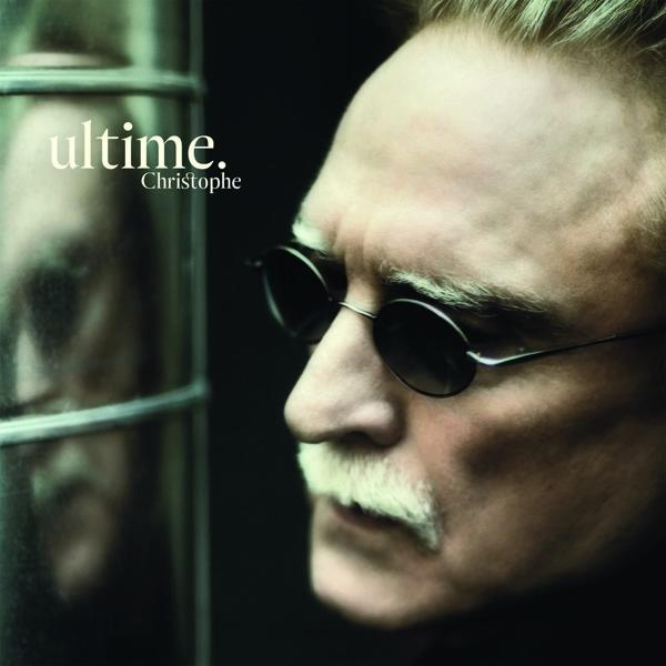 Pochette d'album avec le profil d'un homme portant des lunettes de soleil, avec une moustache. Texte 'ultime'.