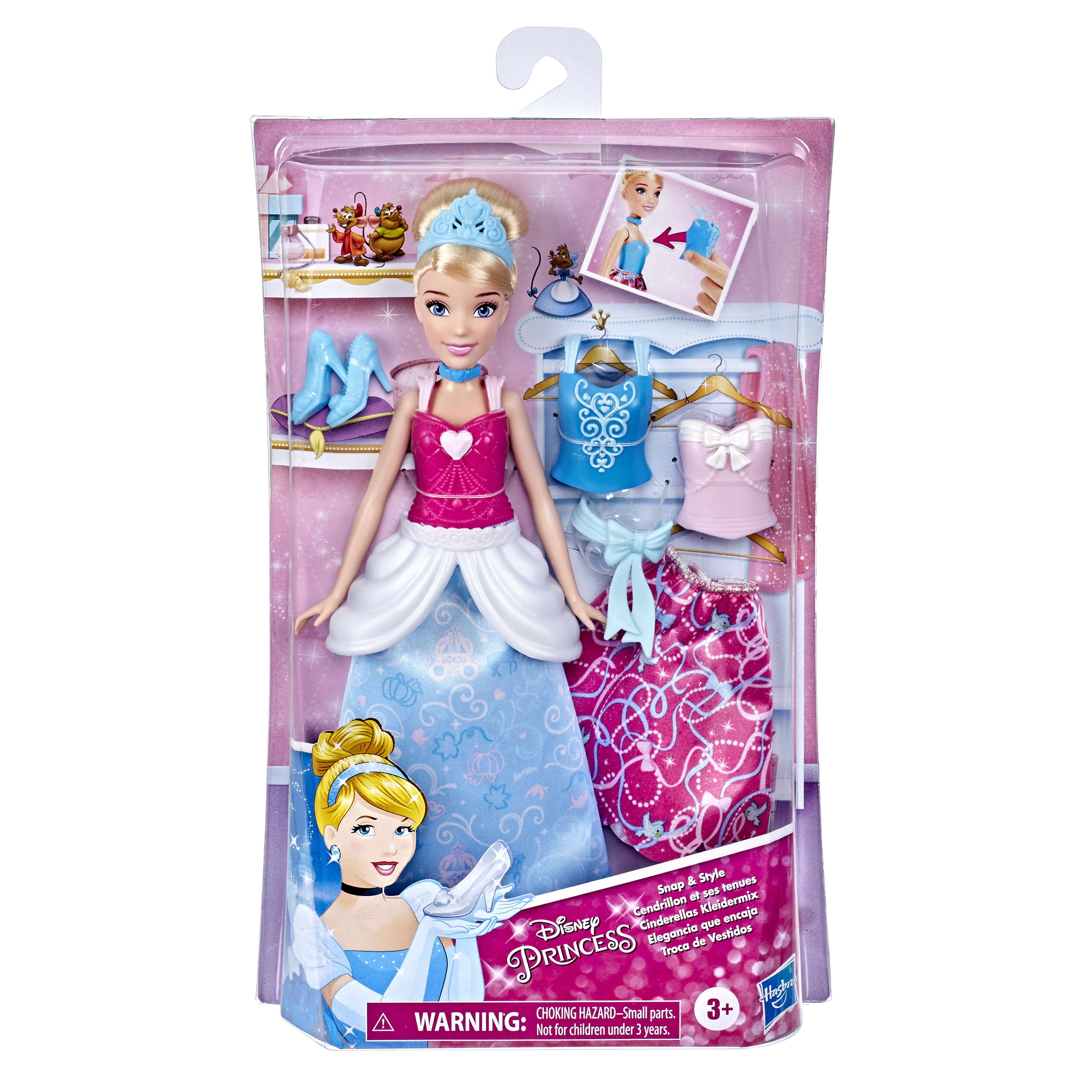 Eine Cinderella-Puppe in einer Verpackung mit zusätzlicher Kleidung. Die Puppe trägt ein blaues Kleid, weitere Optionen.