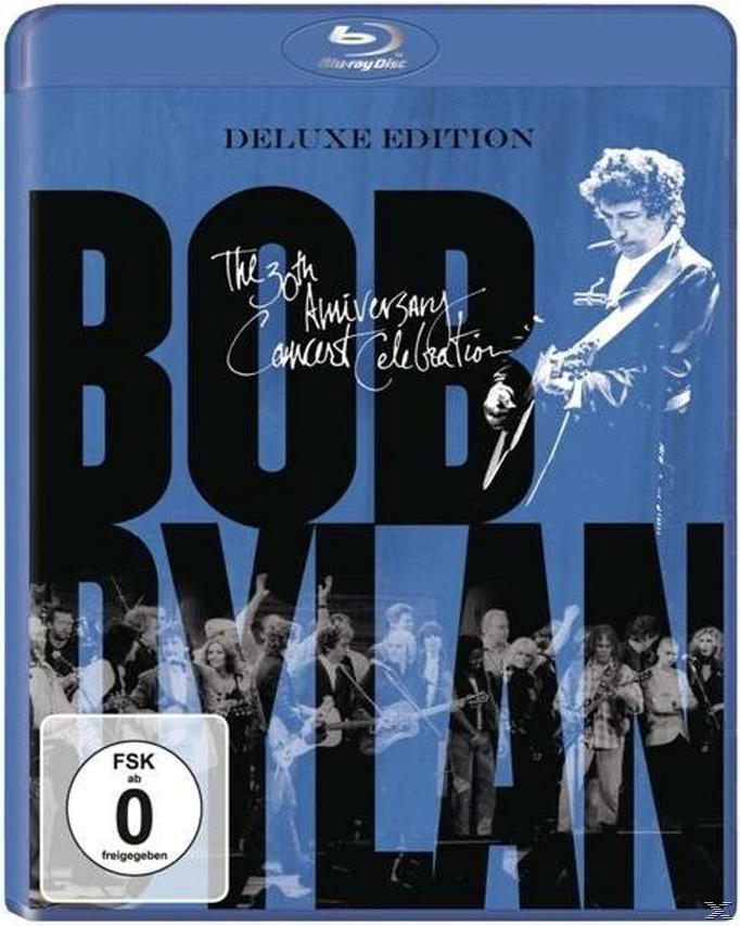 Bob Dylan 30. évfordulós koncertjének Blu-ray borítója, Dylannel, aki gitárt tart.