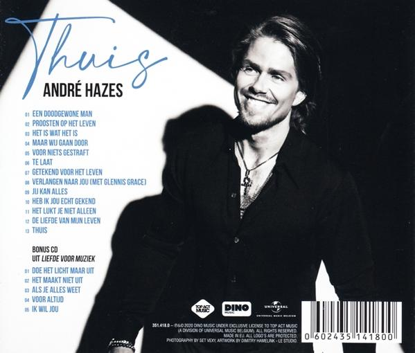 Pochette de CD avec un homme souriant. La pochette comprend une liste des titres.