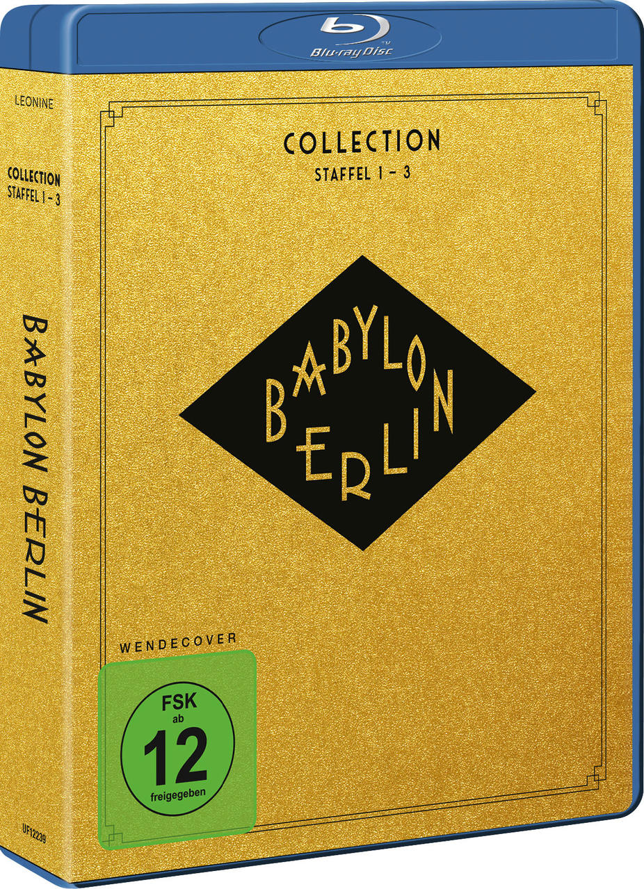Babylon Berlin Blu-ray-Box-Set mit goldenem Cover, schwarzem Diamant-Logo, blauen Akzenten.