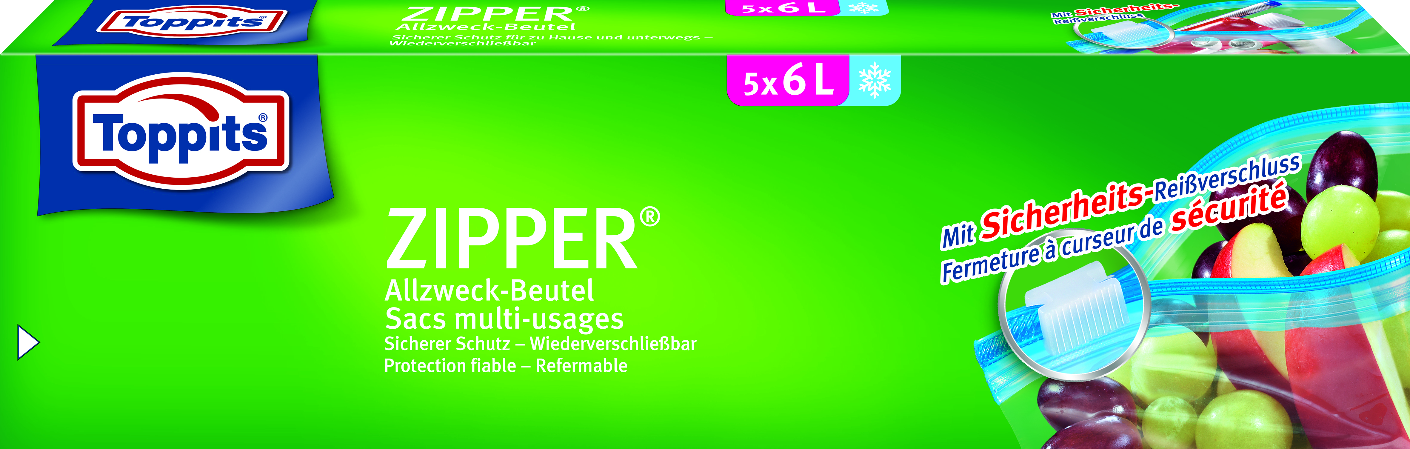 Eine grün-weiße Toppits-Tüte mit Zipper-Beuteln und Früchten darin.