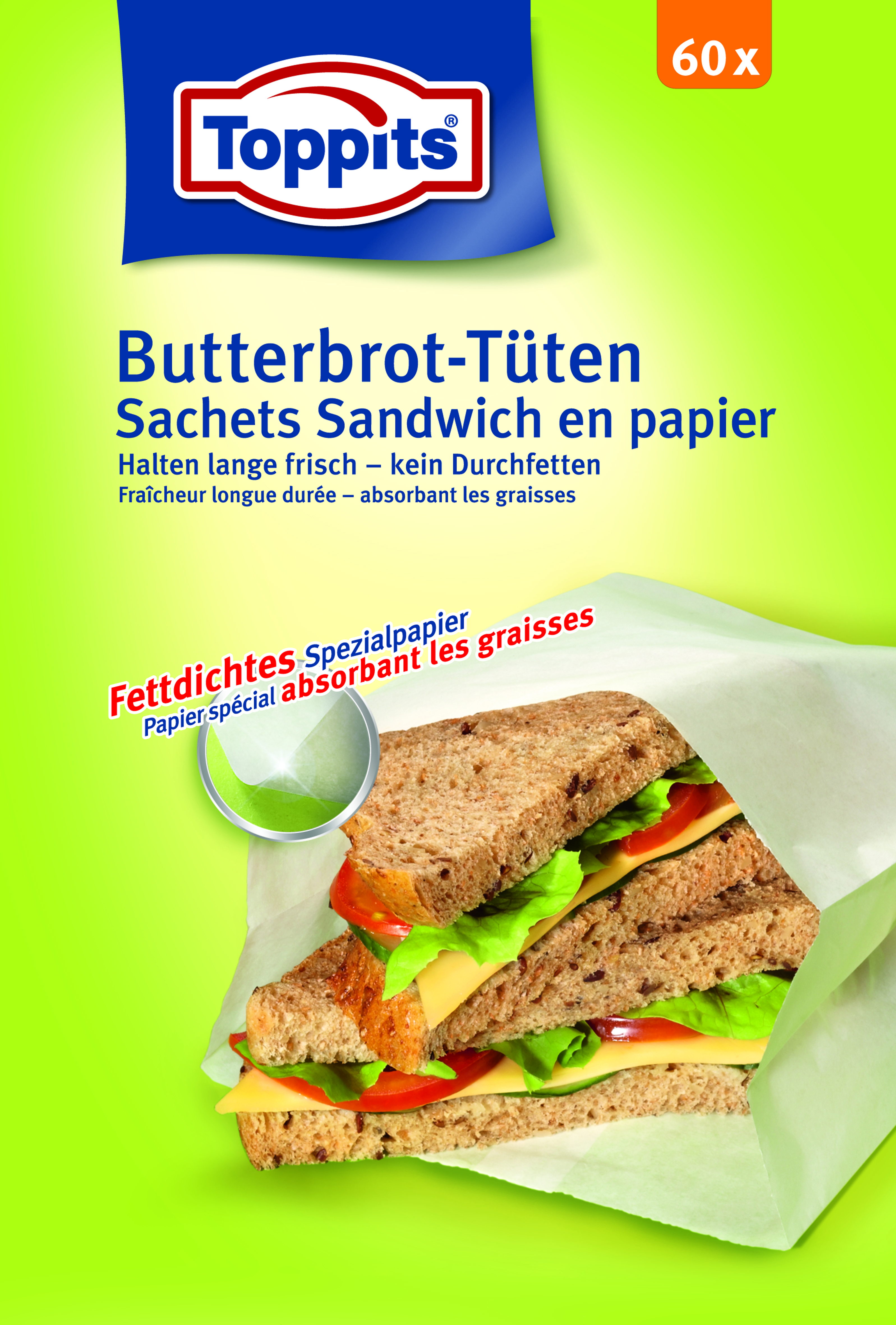 Ein Sandwich in einer Papiertüte mit Salat, Tomate und Käse. Die Tüte befindet sich auf einem grün-gelben Hintergrund.