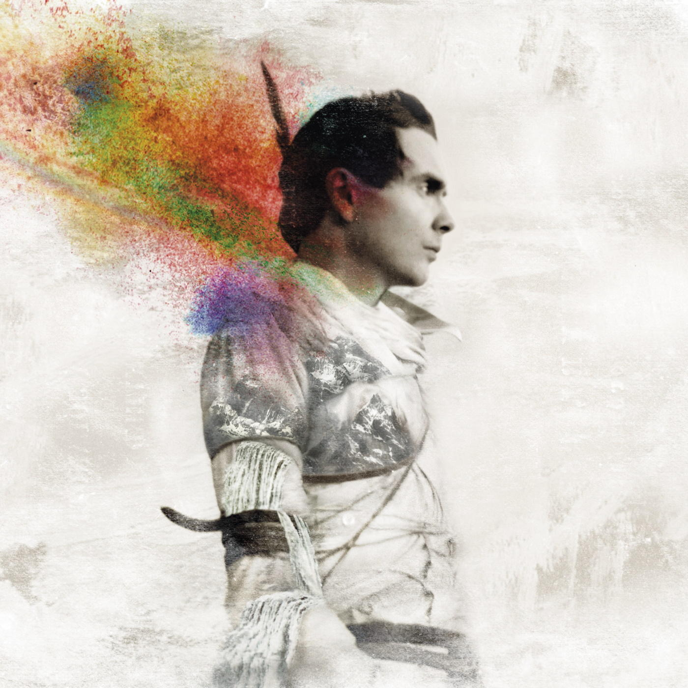 A sepia-toned image of a man with a colorful cloud effect emanating from his shoulder.