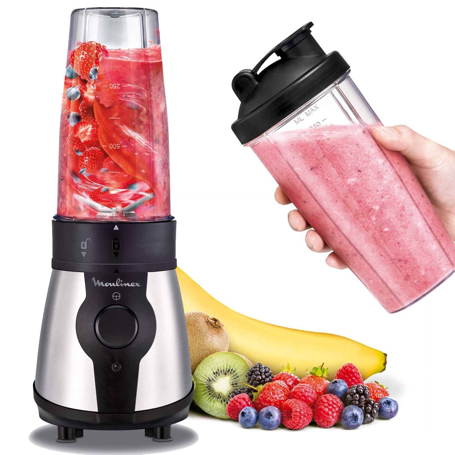 Una licuadora y una botella con batido. Frutas en la superficie.
