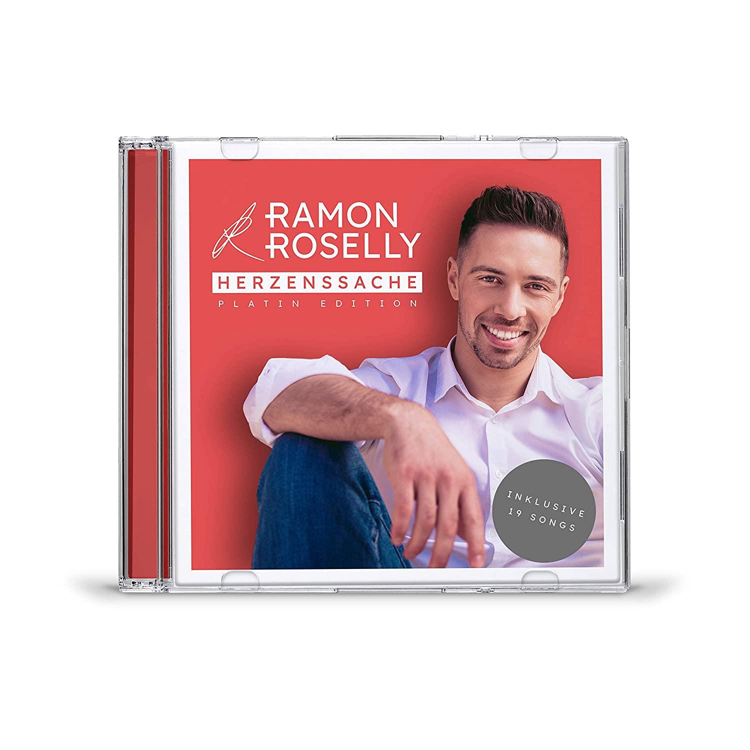 CD-Cover mit lächelndem Mann und dem Text 'Herzenssache' mit dem Namen des Künstlers.