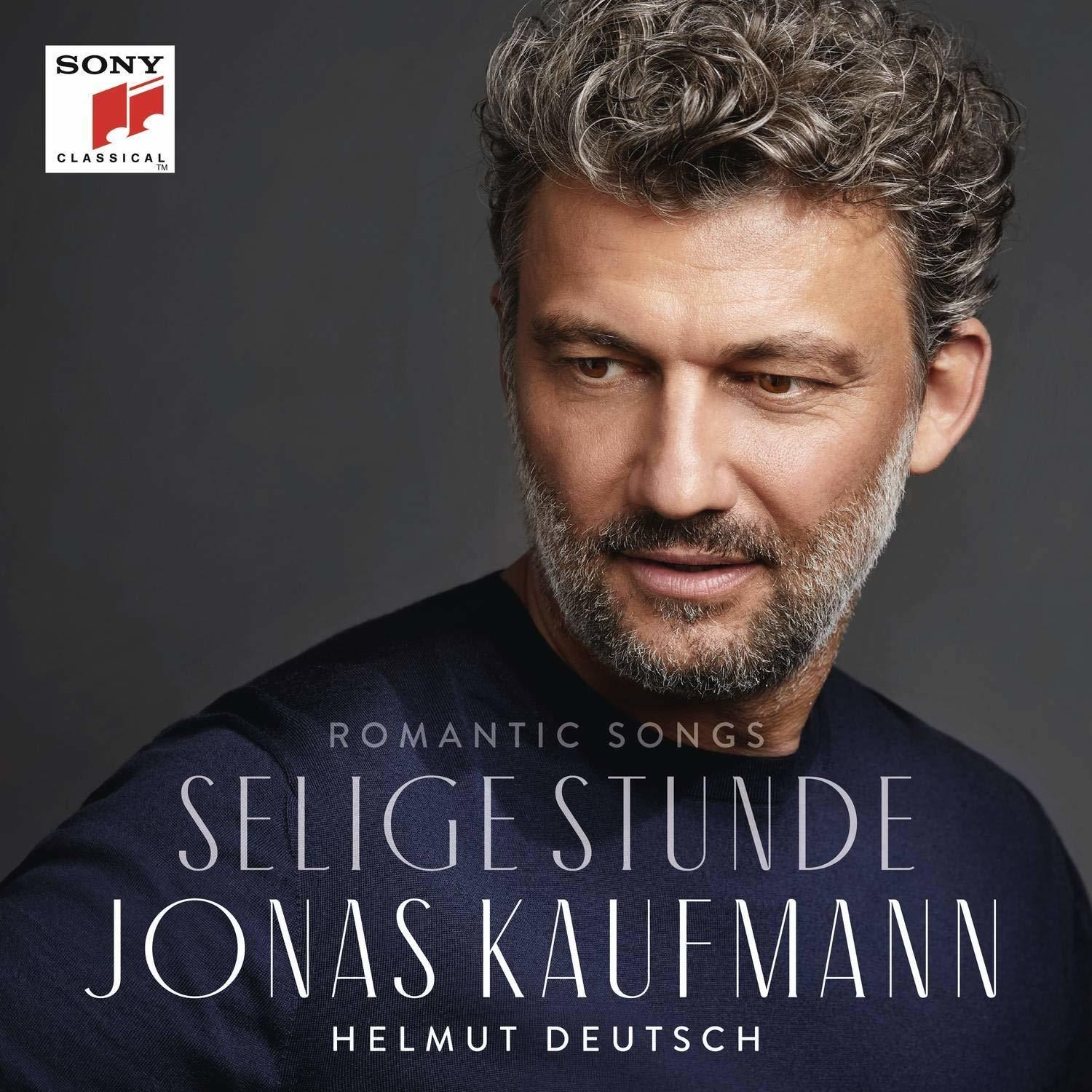 Albumcover mit dem Gesicht eines Mannes und dem Text 'Selige Stunde' und 'Jonas Kaufmann'.