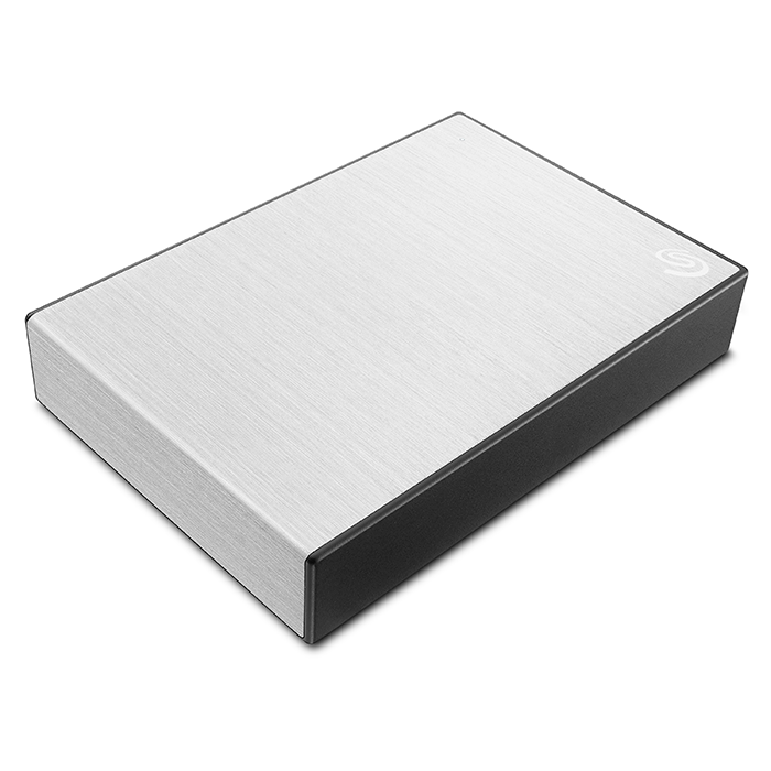 Silver Seagate external hard drive on a white surface. Black edges and Seagate logo present.
