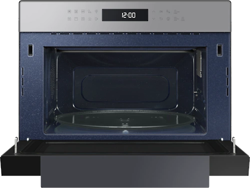 An open microwave oven shows the interior, a glass plate, and digital clock displaying 12:00.