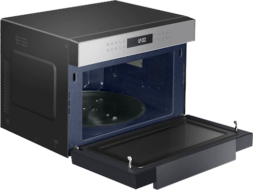 Black microwave with open door. Interior has a glass plate. Silver control panel.