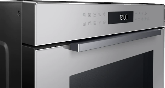 Stainless steel oven with a digital display showing '12:00'. There are icons and a handle below.
