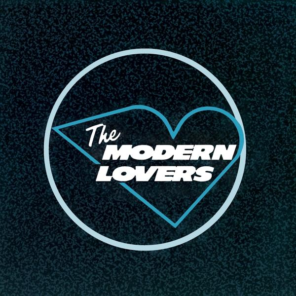 Logo circulaire avec cœur bleu et texte : 'The MODERN LOVERS' sur fond sombre.