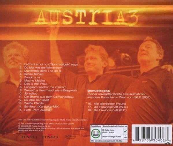 Die Rückseite einer CD mit drei Männern auf der Bühne und Text.