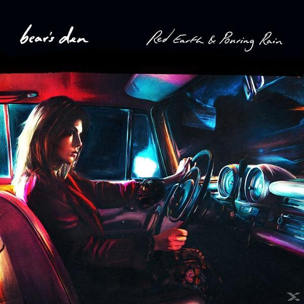 A Bear's Den "Red Earth & Pouring Rain" című albumának borítója. Egy nő éjszaka vezet autót, piros belső térrel.