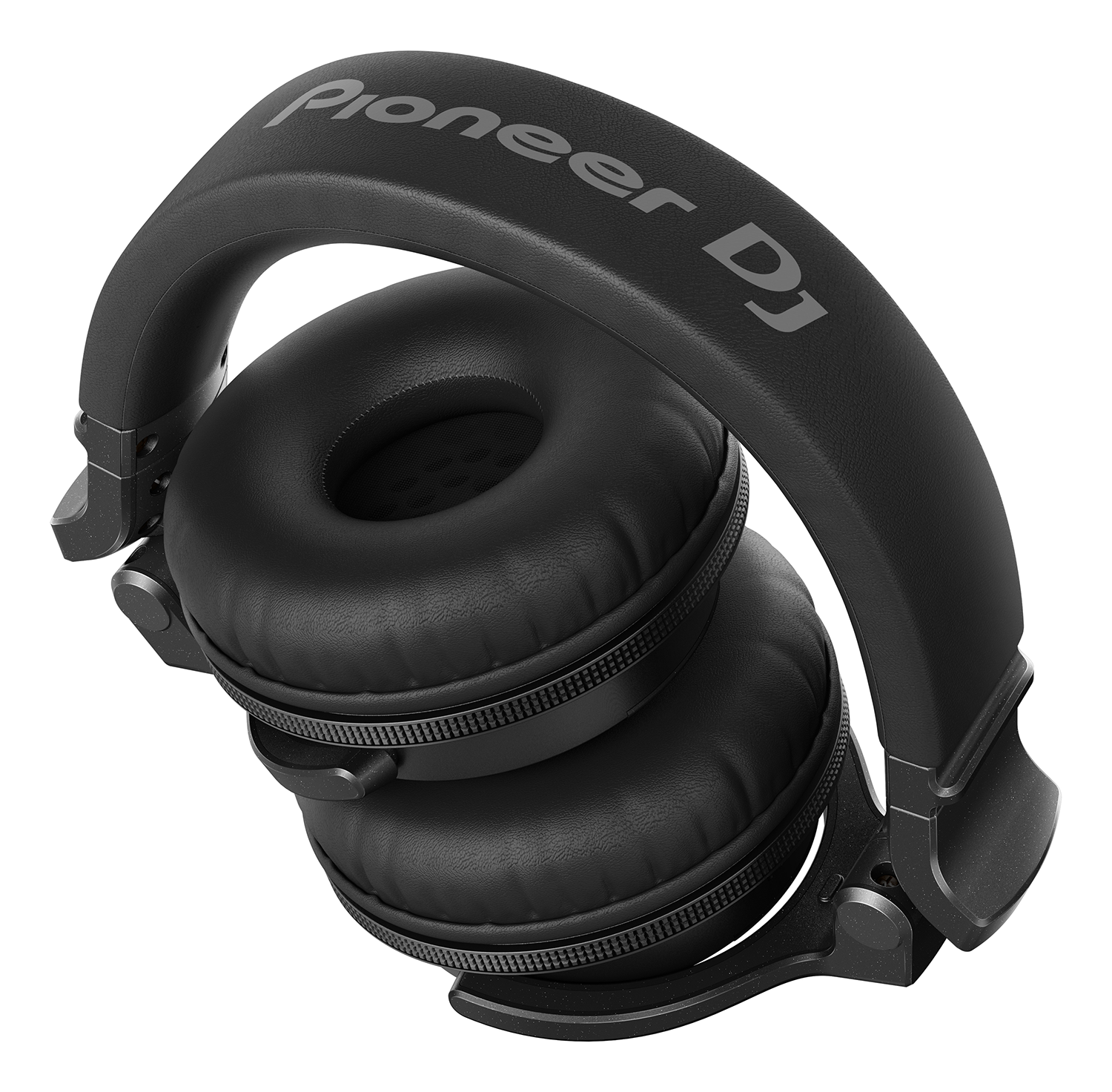 Black Pioneer DJ headphones on a white surface. The headphones are angled, showing the earcups.