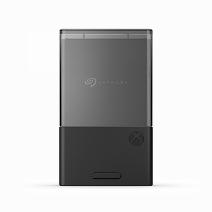 A black storage device with a clear cover and a green Xbox logo on the bottom.