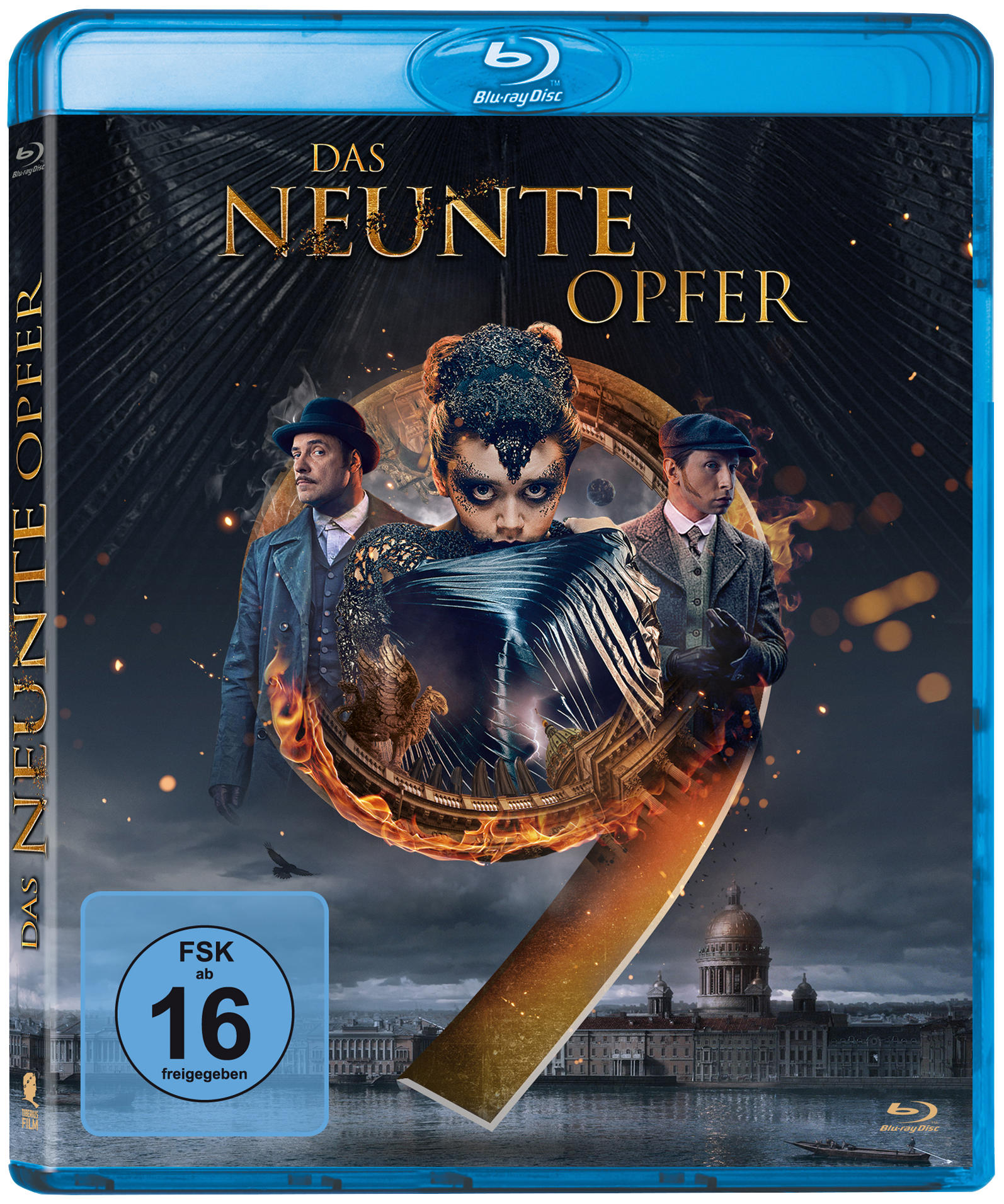 Blu-ray-Hülle mit Filmcover, das drei Figuren, dunkle Farben und eine blaue Hülle zeigt.