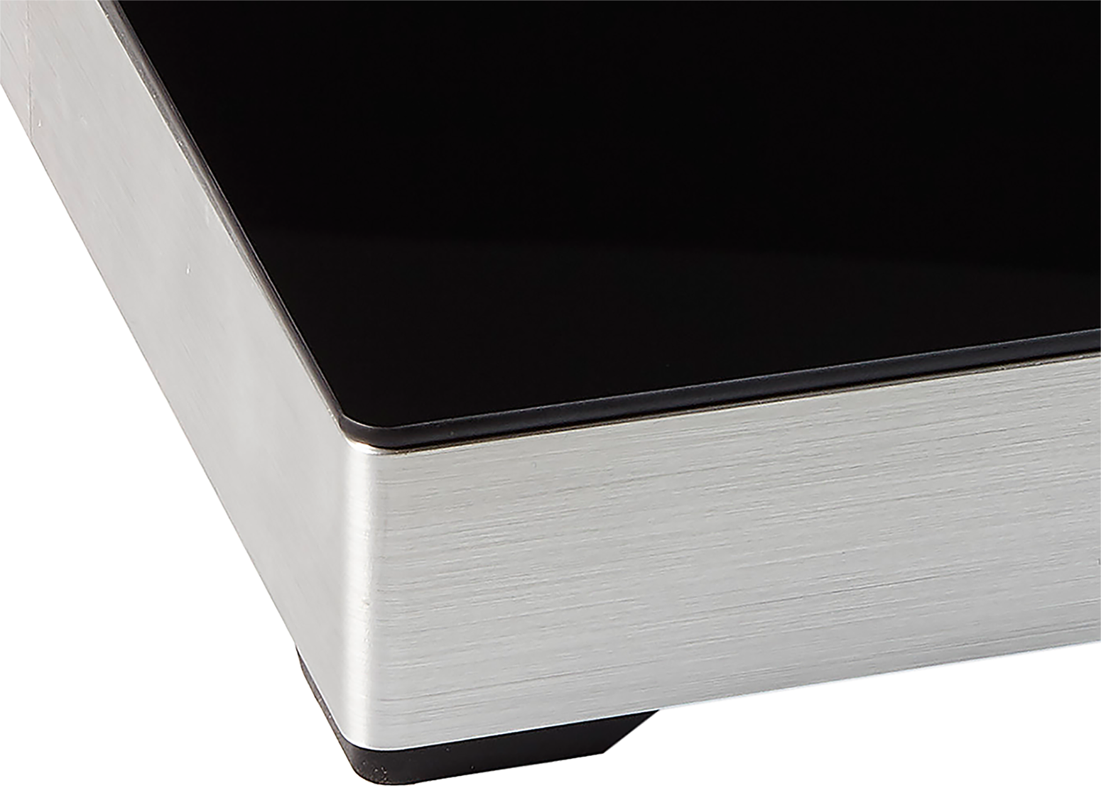 Close-up of a table corner. Silver metal frame with a black surface. A small, black foot is at the bottom.
