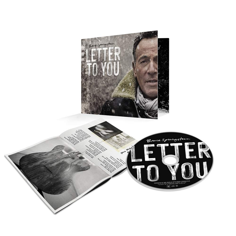 Bruce Springsteen Letter to You CD tokja és lemeze, valamint egy füzet dalszövegekkel és képekkel.