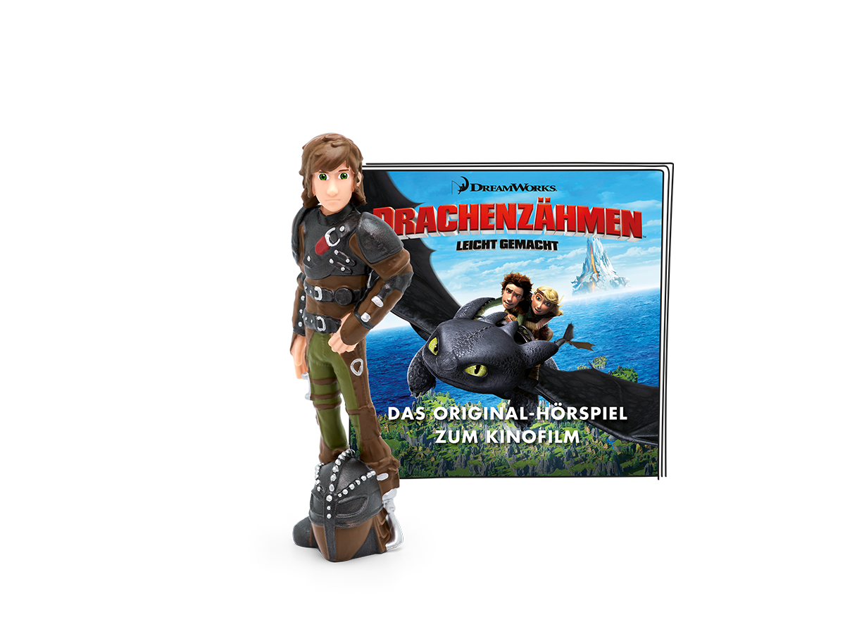 Eine Figur eines Drachentrainers mit einer DVD-Hülle des zugehörigen Films daneben.
