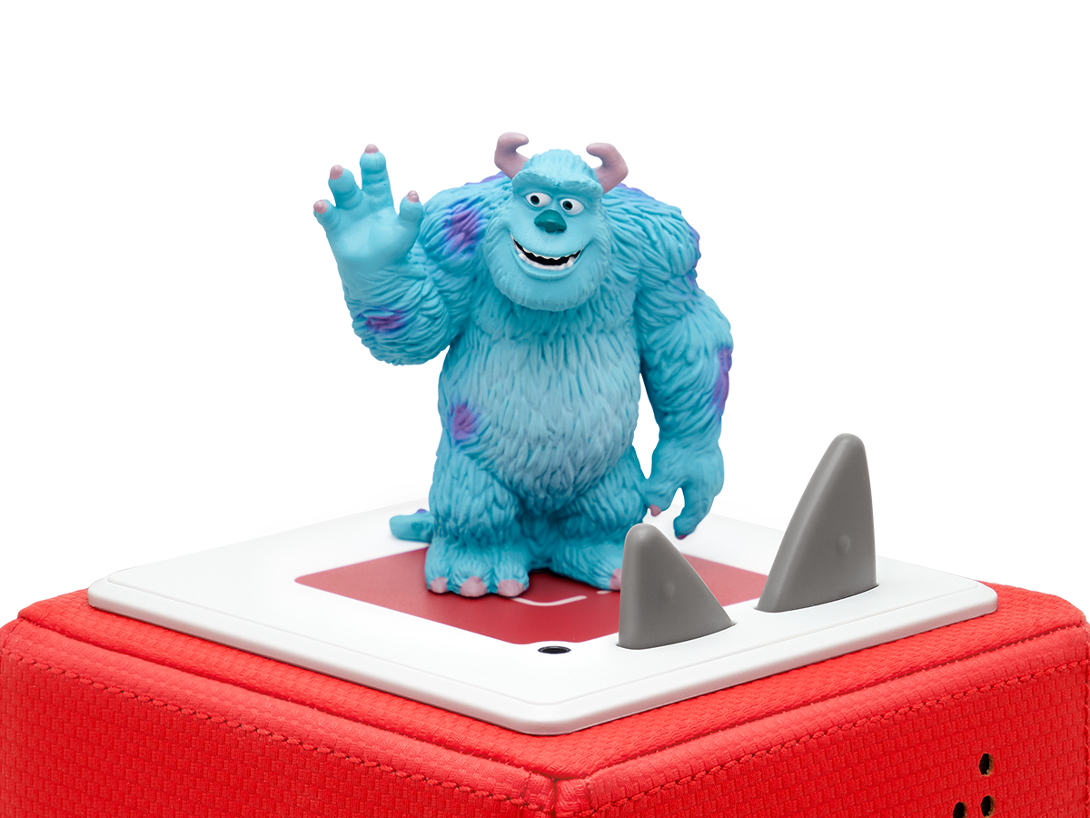 Eine Sully-Spielzeugfigur aus Monster AG auf einer roten Plattform.