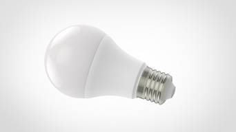 Bombilla LED blanca, acostada sobre un fondo blanco, con la base mirando al espectador.
