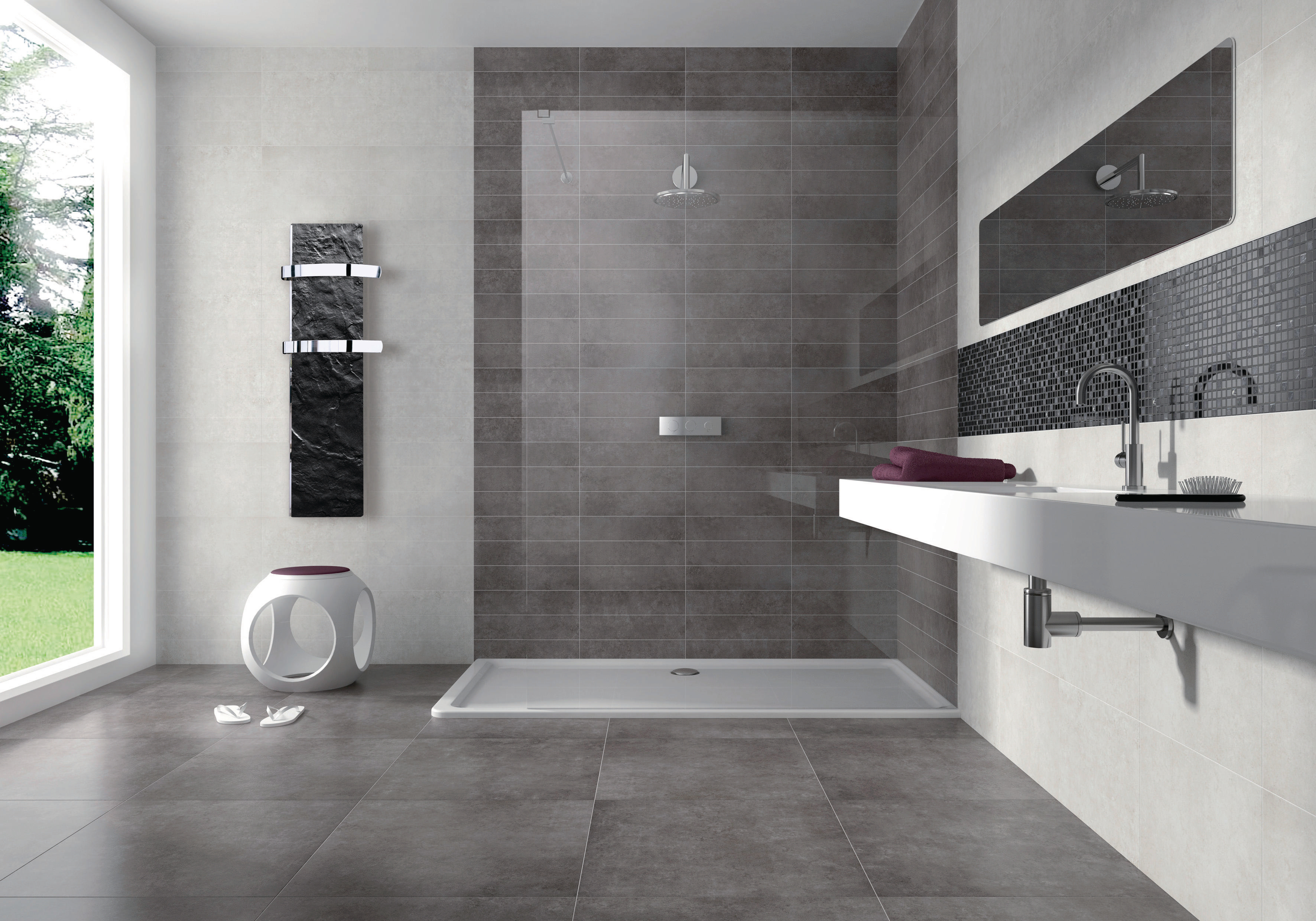 Modernes Badezimmer mit grauen Fliesen, Dusche und weißem Waschbecken. Großes Fenster.