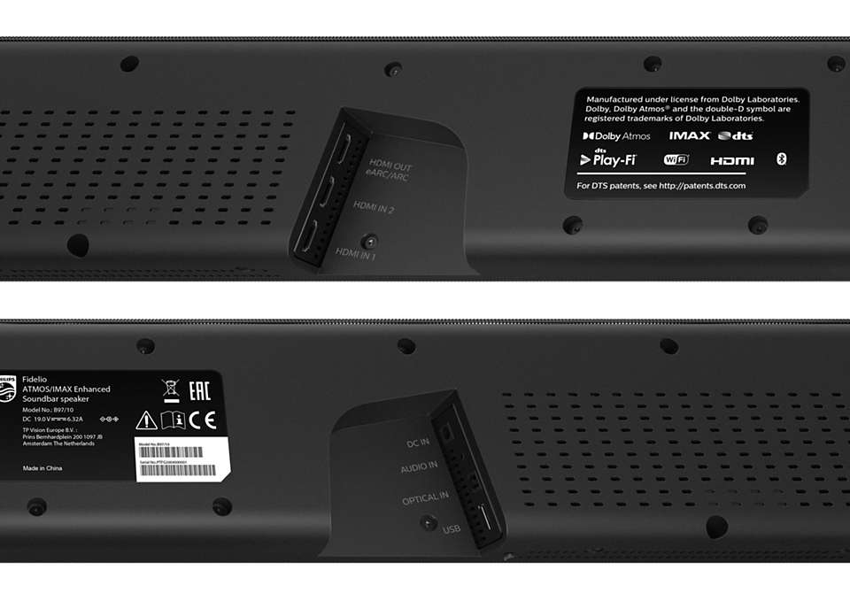 Eine schwarze und graue Soundbar mit Anschlüssen und einem weißen Dolby Atmos-Label.