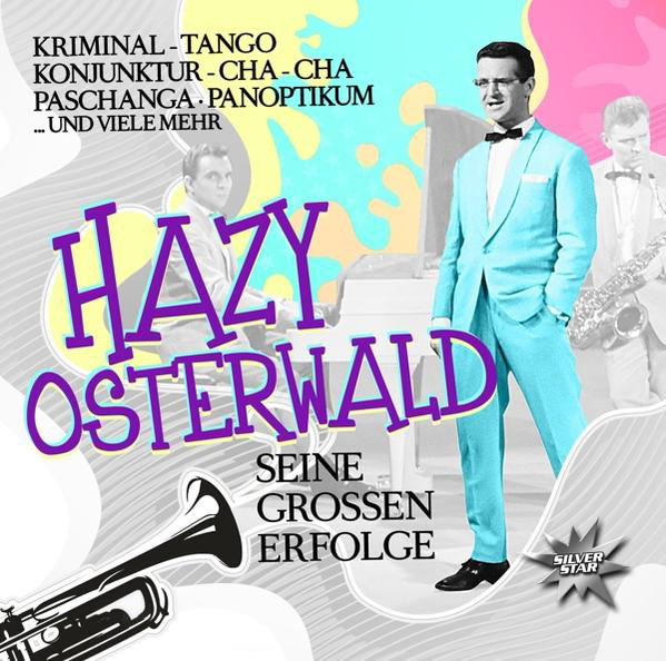 Albumcover mit Text und einem Mann in hellblauem Anzug, mit Bandmitgliedern.