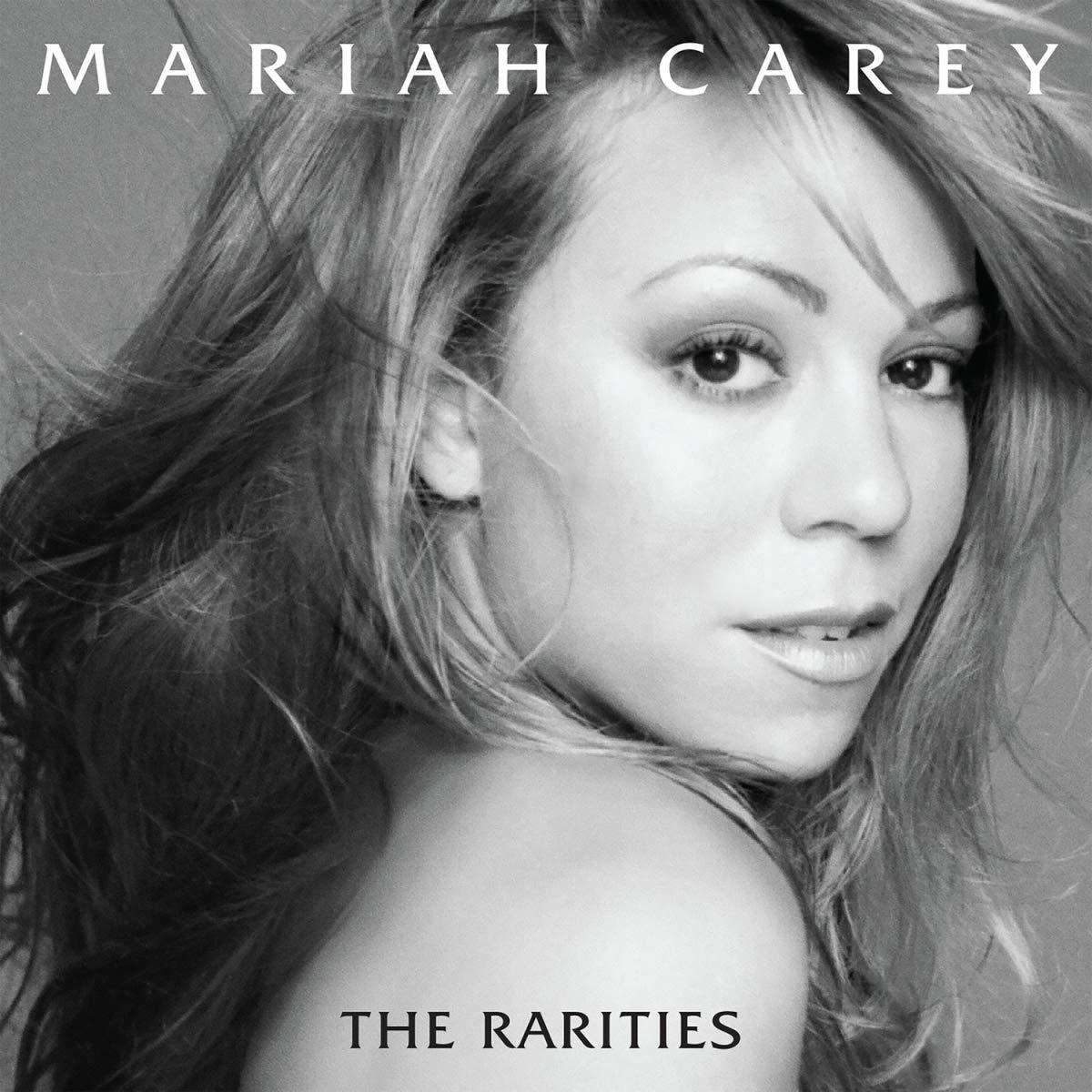 Pochette d'album de Mariah Carey en noir et blanc avec son visage en gros plan et le titre THE RARITIES.