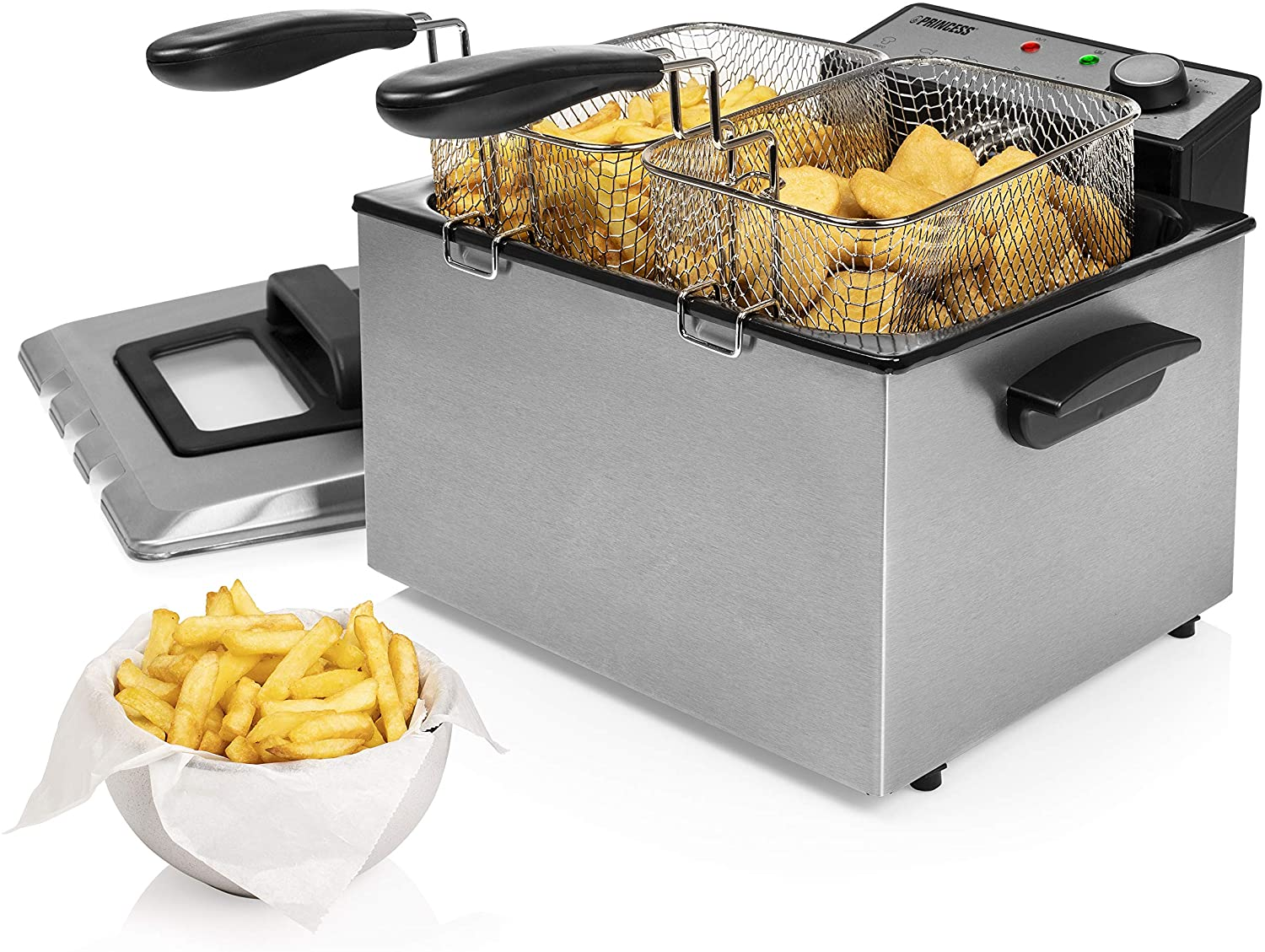 Edelstahl-Fritteuse mit zwei Körben voller Pommes und Chicken Nuggets, mit einer Schüssel.