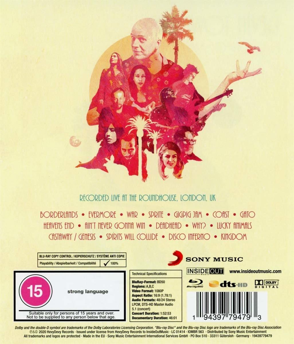 Back of a DVD case showing a band on stage, with text.