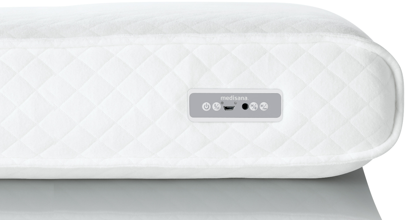 Een wit, gewatteerd matras met een bedieningspaneel. Het paneel heeft knoppen en een logo. De achtergrond is een lichtgrijze ondergrond.
