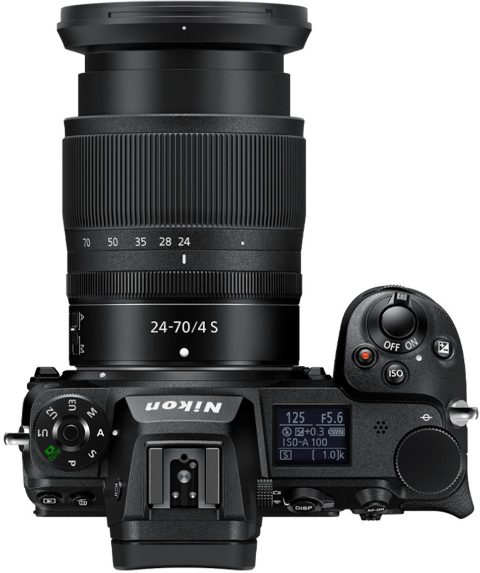 Top-Ansicht einer schwarzen Nikon-Systemkamera mit 24-70mm-Objektiv und LCD-Display.