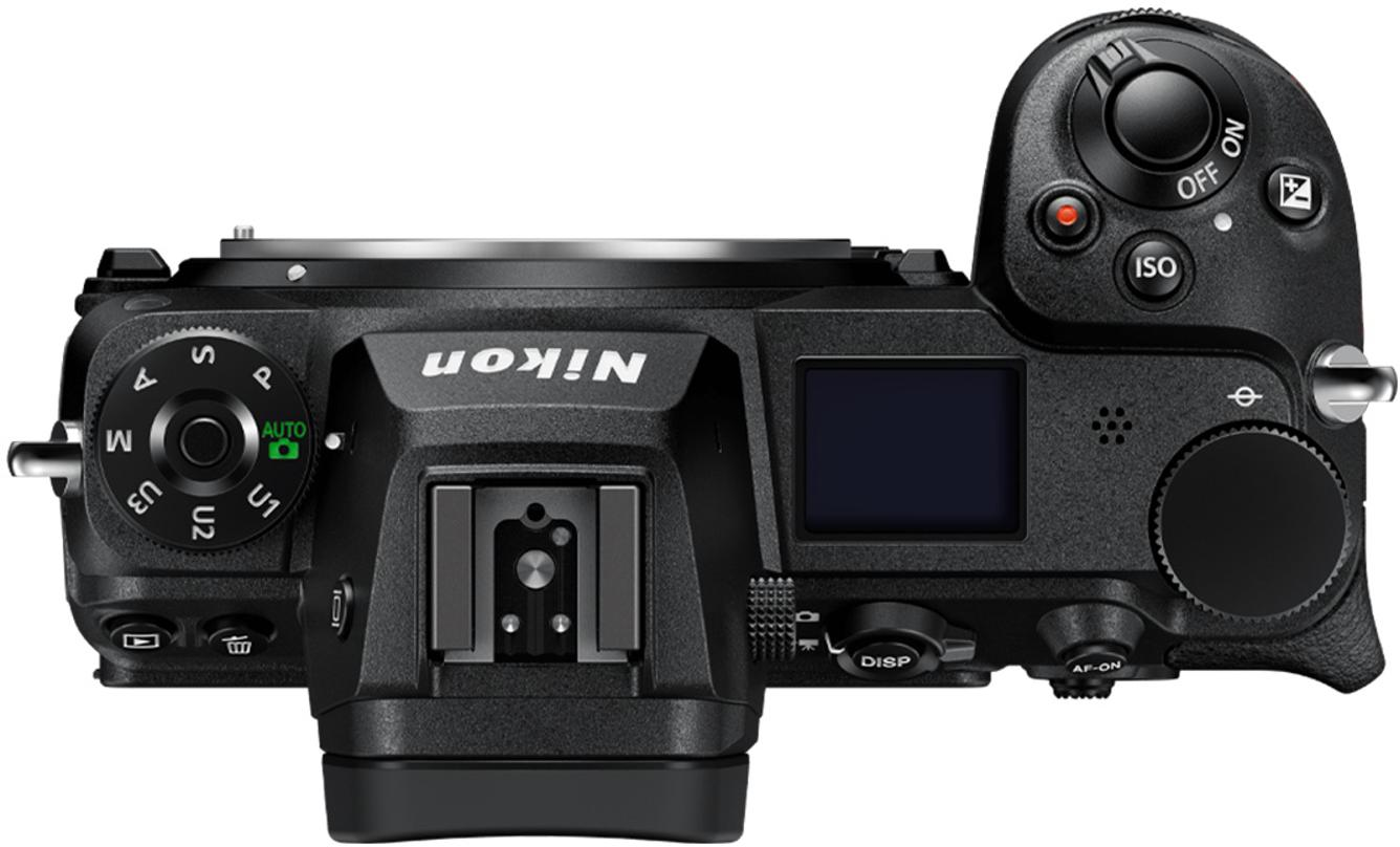 Draufsicht auf eine schwarze Nikon-Kamera mit Einstellrädern und Knöpfen auf dem Kameragehäuse.