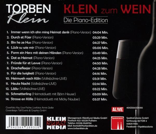 Rückseite eines Albums mit Songtiteln, Weinglas und einer Flaschensilhouette.