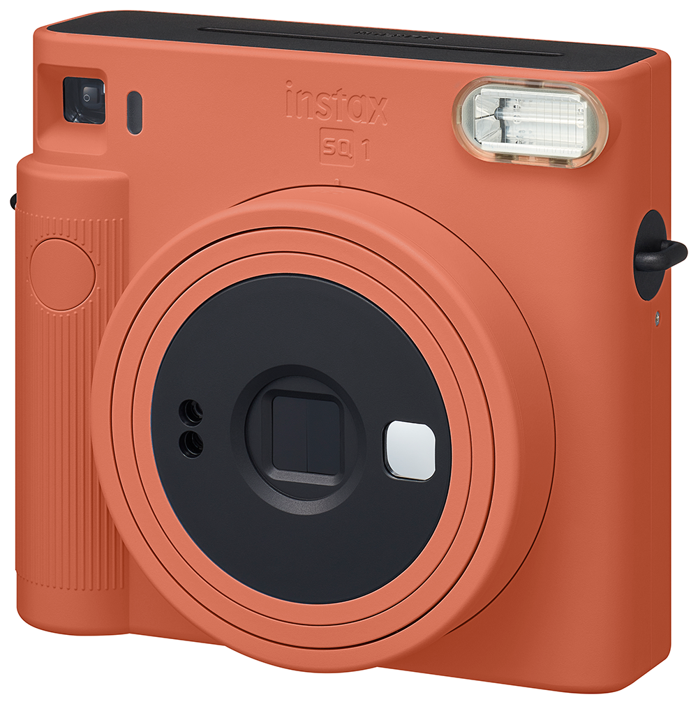 Orange Instax SQ1 instant camera with a flash, lens, and black accents. 