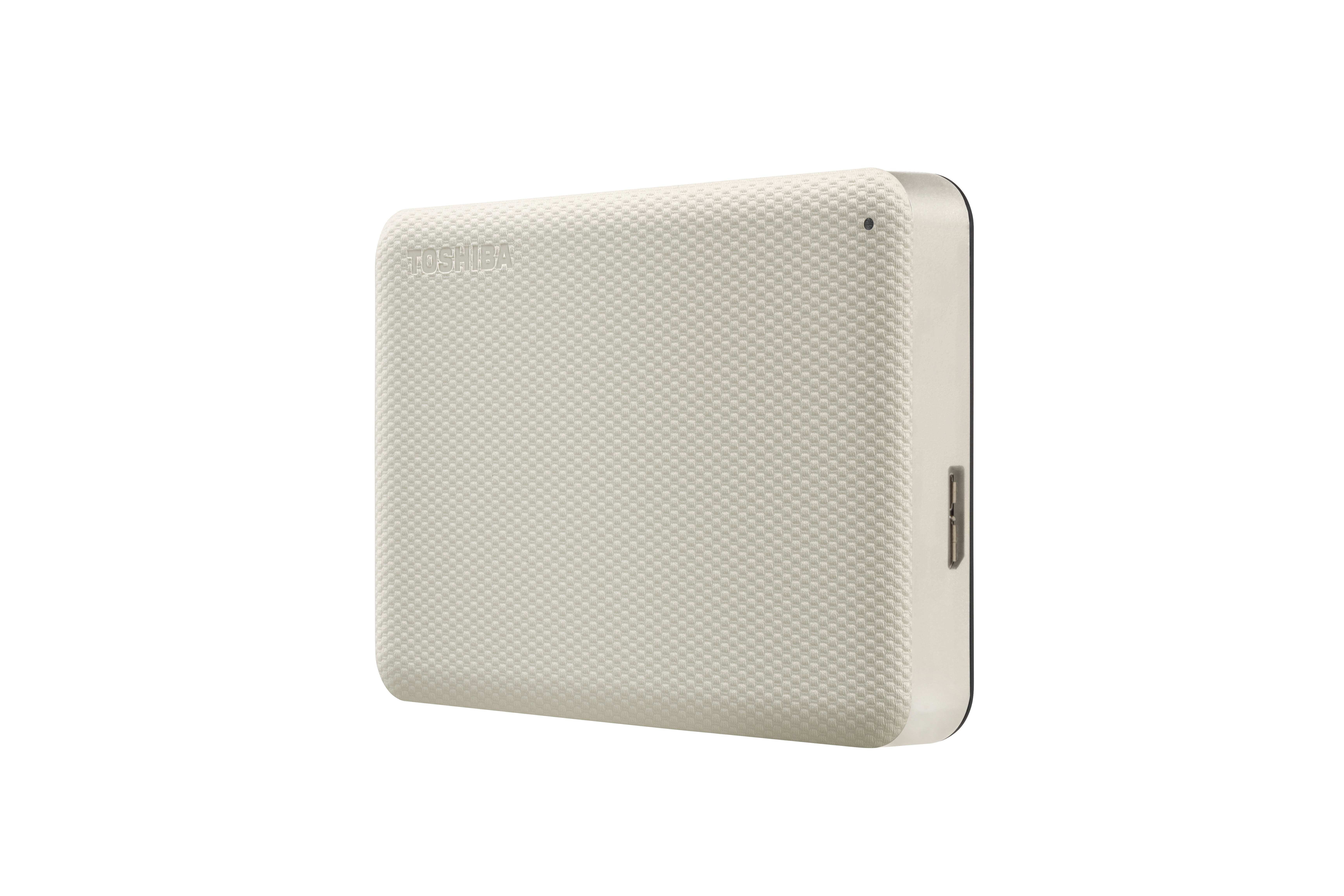 Eine beige, strukturierte externe Festplatte von Toshiba mit dem Toshiba-Logo.