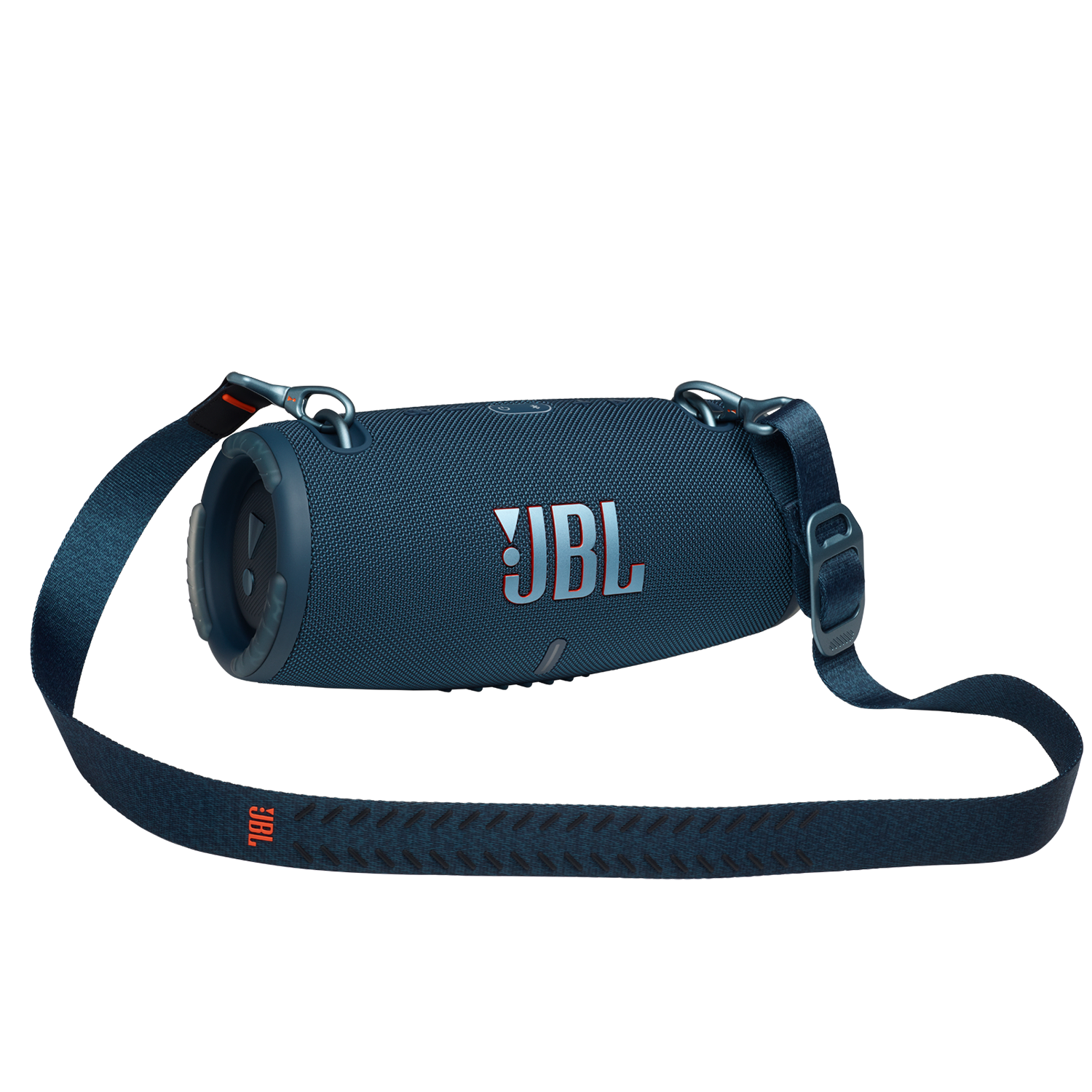 Een blauwe JBL-luidspreker met een zwarte riem. JBL-logo op de voorkant. Donkere achtergrond.
